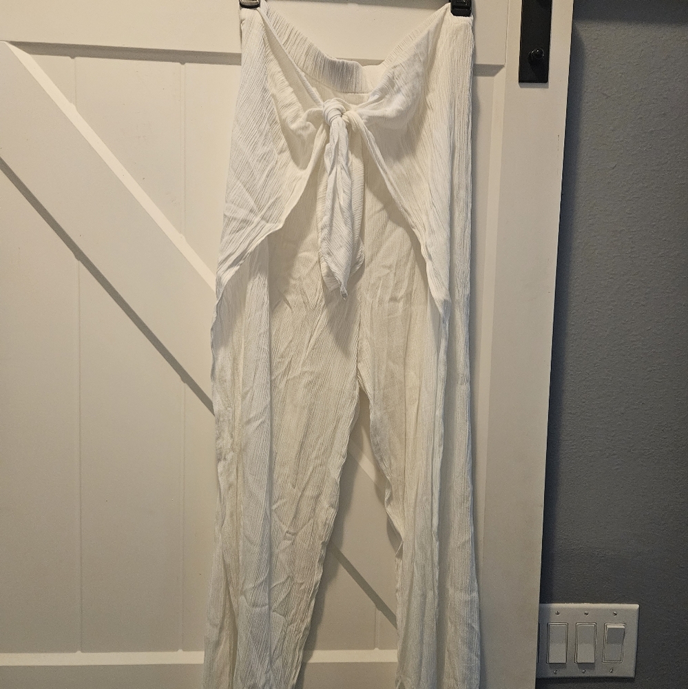 Light weight elastic waist cover-up pants. Size XL